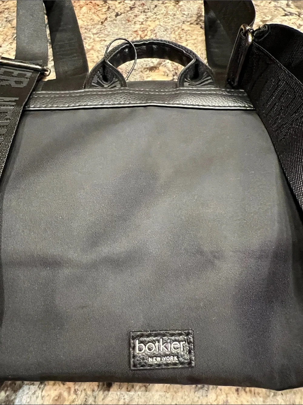 NWT’S Botkier New York Trigger Mini Backpack in sleek black & Faux Leather Trim